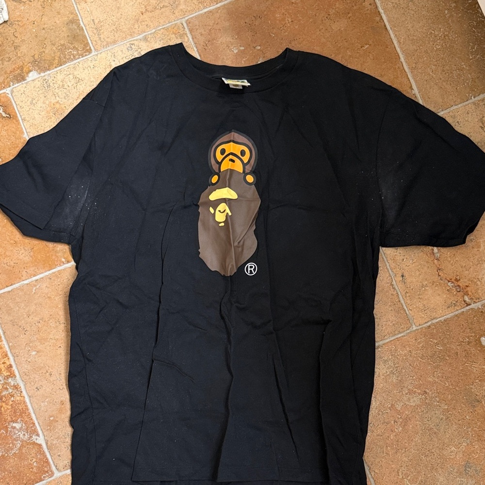 A Bathing Ape (BAPE) Black Ape Head Graphic Tee with stains fits xl